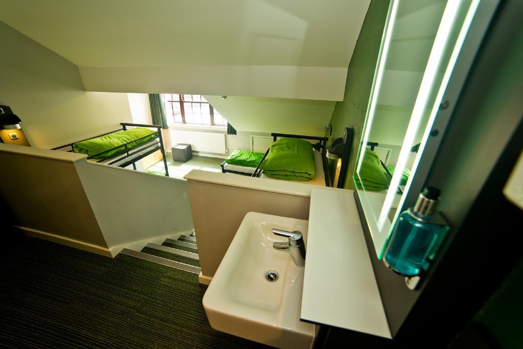 Bunk Bed in Male Dormitory Room with Shared Bathroom